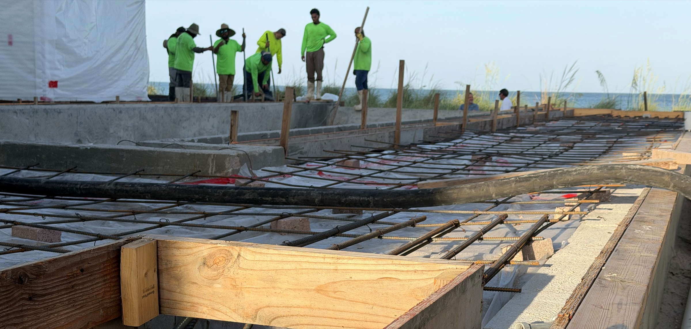 Our crew forming and pouring an elevated slab at a beachfront home on the Gulf